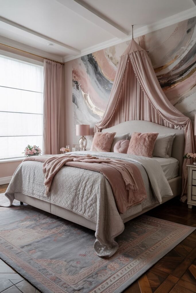 A bold pink and grey bedroom showcasing a mural with pink, grey, and gold tones, a sheer pink canopy, and a bed with layers of pink and grey bedding.
