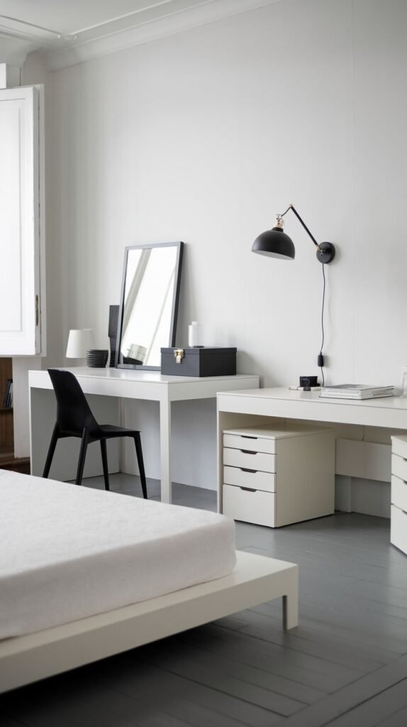 A bright and Chic Contemporary bedroom decor with a minimalist aesthetic, featuring white walls, a white desk setup with a black chair, and a simple bed frame.