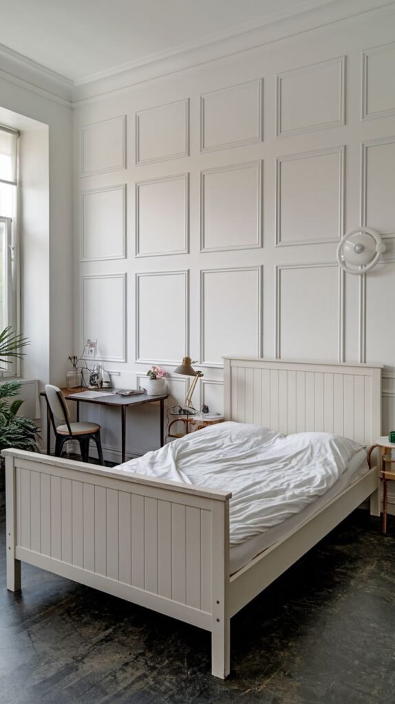 A classic and bright bedroom showcases extensive white framed wall paneling, creating a traditional yet airy atmosphere, a versatile look for PVC applications.