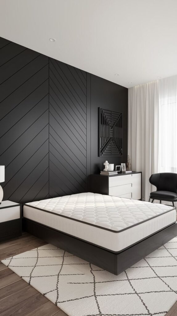 A black wall with wide diagonal paneling on the sides and a central feature composed of a framed, intricate black geometric relief art piece.