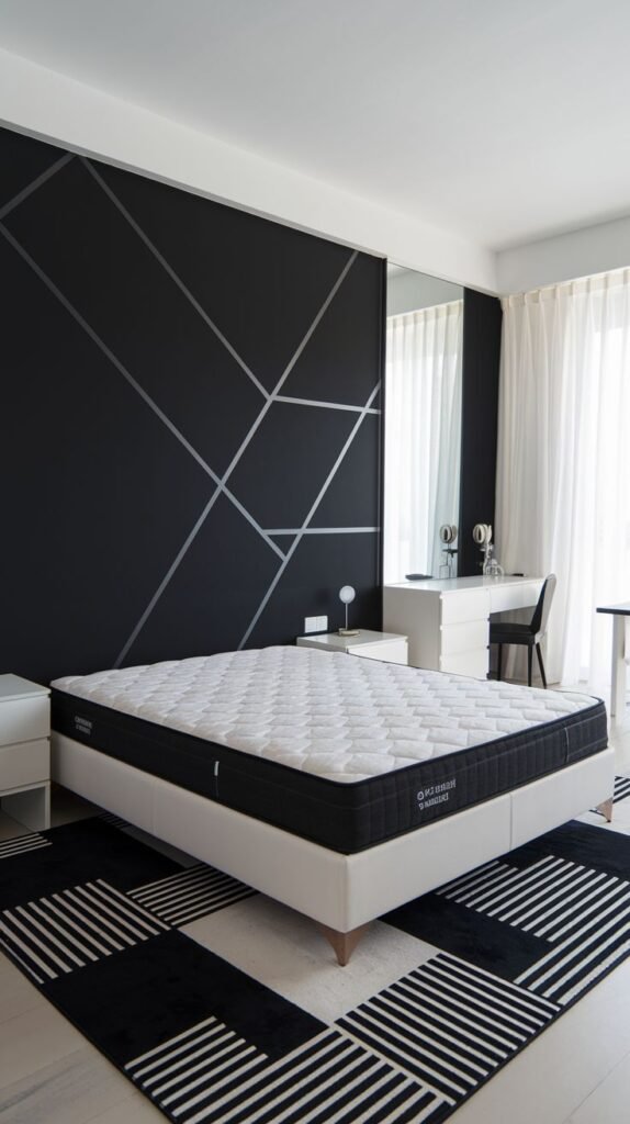 A black accent wall decorated with thin metallic silver lines forming a complex, abstract angular pattern across the surface.