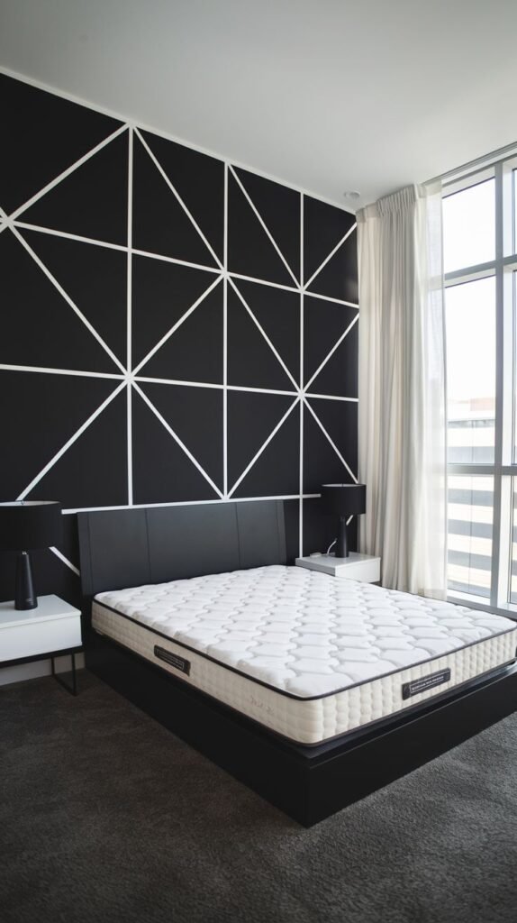 A minimalist bedroom featuring a black wall covered in a dense, complex pattern of thin white lines forming multiple intersecting triangles and geometric shapes.