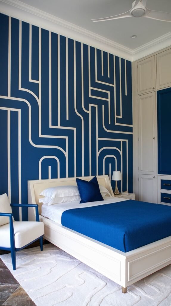 Abstract Blue Wall with Modern White Line Art Design Accent wall painted in deep blue with a striking, modern abstract mural composed of white lines, curves, and vertical elements, creating a maze-like pattern.