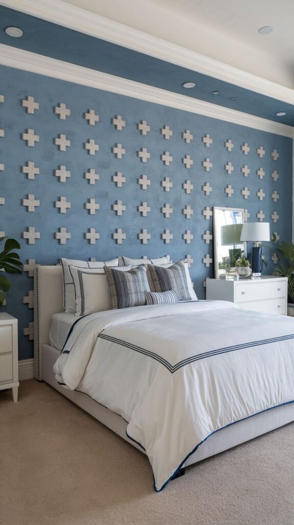 Dusty Blue Wall with 3D White Cross Pattern Overlay Modern blue accent wall with a dusty tone, decorated with a symmetrical grid pattern of three-dimensional white protruding cross shapes.