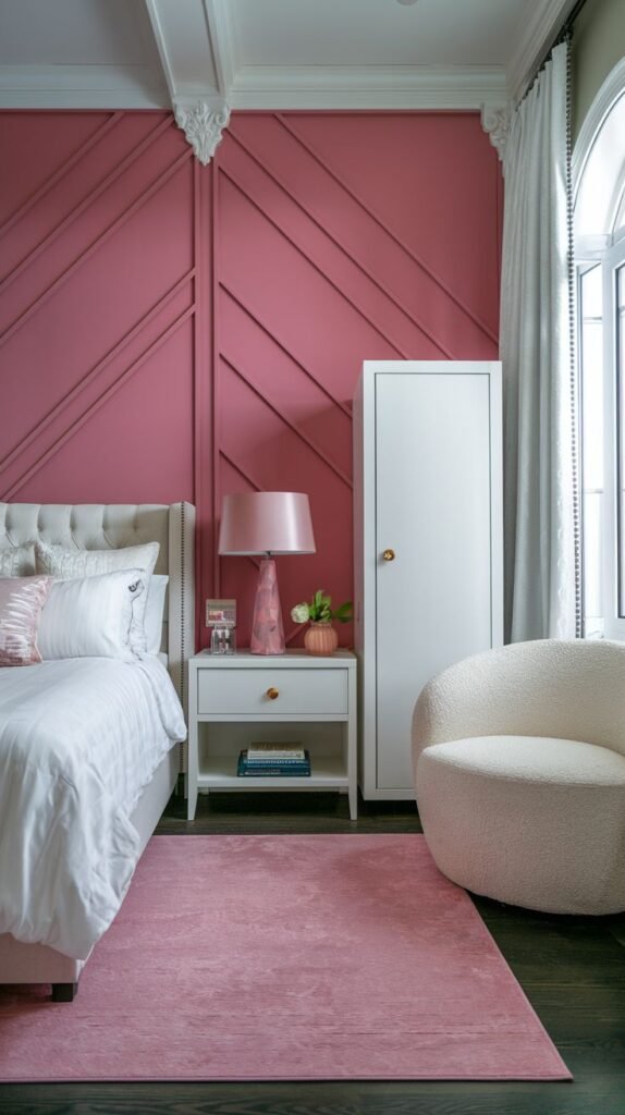 Mauve pink accent wall featuring architectural dimension from diagonal linear paneling or trim overlaid in a geometric pattern.