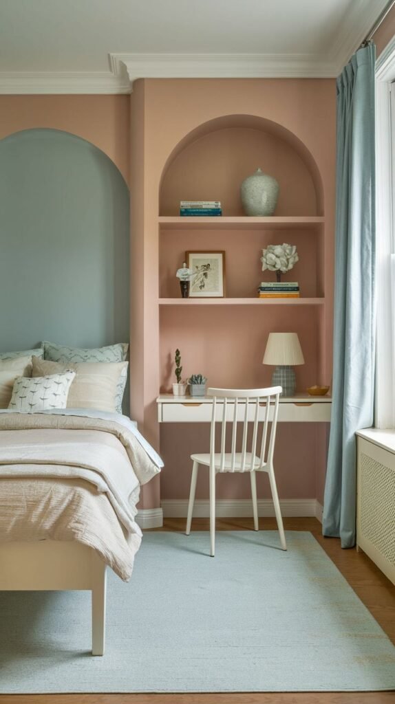 Visually appealing architectural features in this Cozy Small Bedroom for Women include custom arched wall niches in blue-gray and soft pink, the latter incorporating a built-in desk and shelving.
