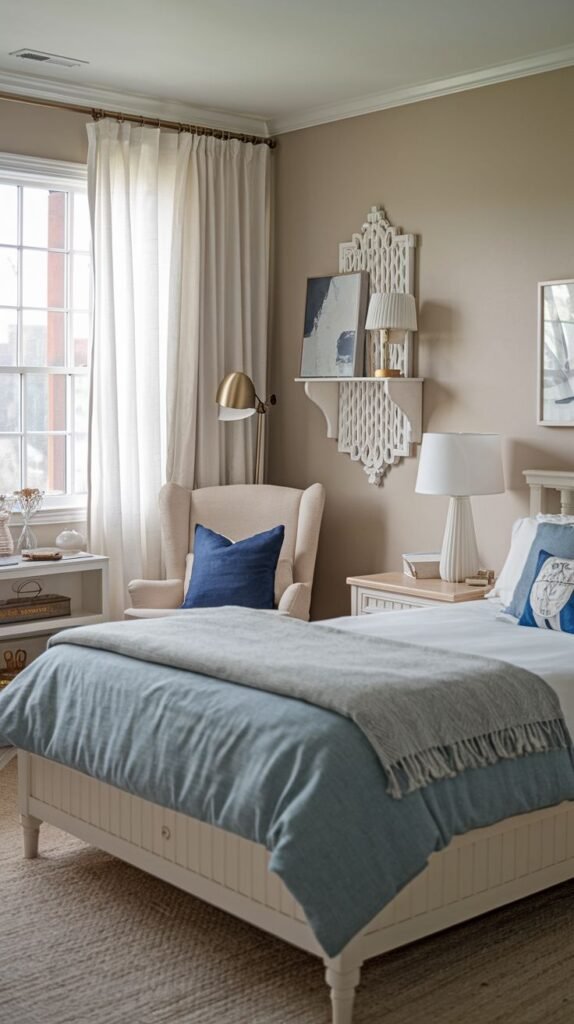 Cozy Small Guest Bedroom in a light and airy design using a white painted bed frame and white decorative shelving with bright blue accent pillows.