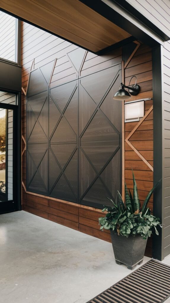 Exterior entryway accent wall featuring horizontal wood siding surrounding a large central dark panel overlaid with a contrasting wooden diamond grid pattern.