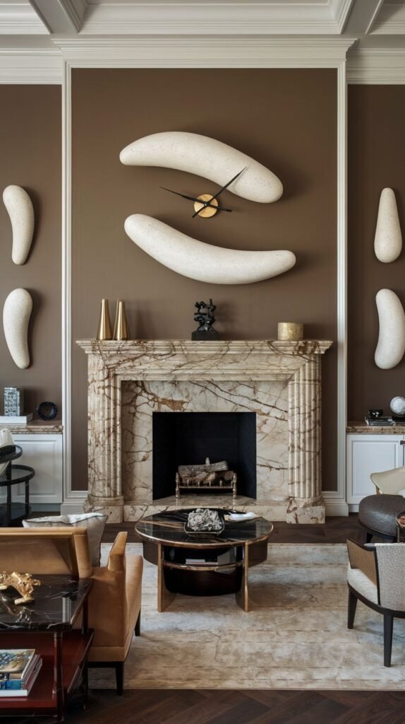 Traditional marble mantelpiece set against a dark brown wall. The wall is decorated with abstract, elongated white sculptural forms, with the central forms acting as a functional wall clock.