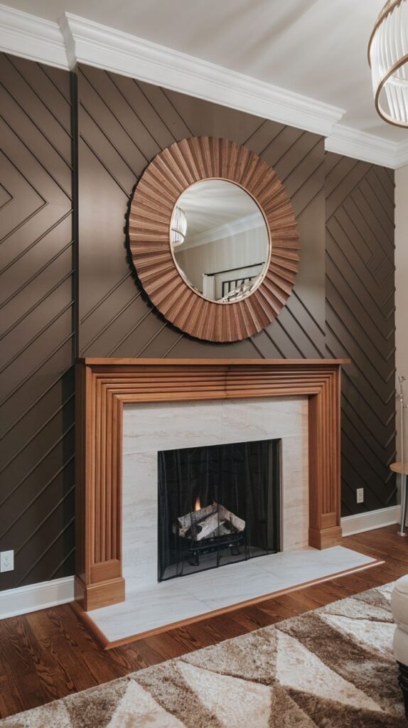 Fireplace mantel with light wood/stone surround. The accent wall features dark brown diagonal wood paneling, centered by a large, circular wooden sunburst mirror.