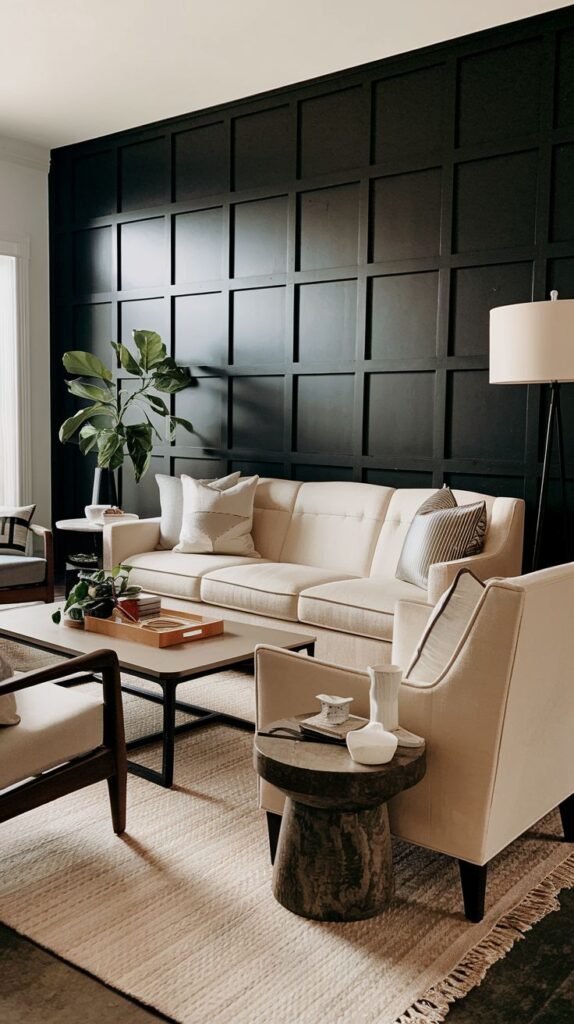 Black accent wall finished with dimensional board and batten paneling creating a square grid texture, behind a cream sofa.